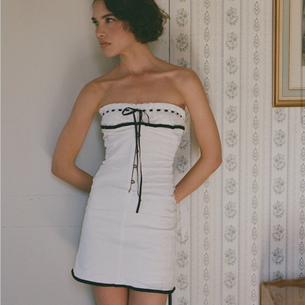 With Jean White and Black Strapless Dress